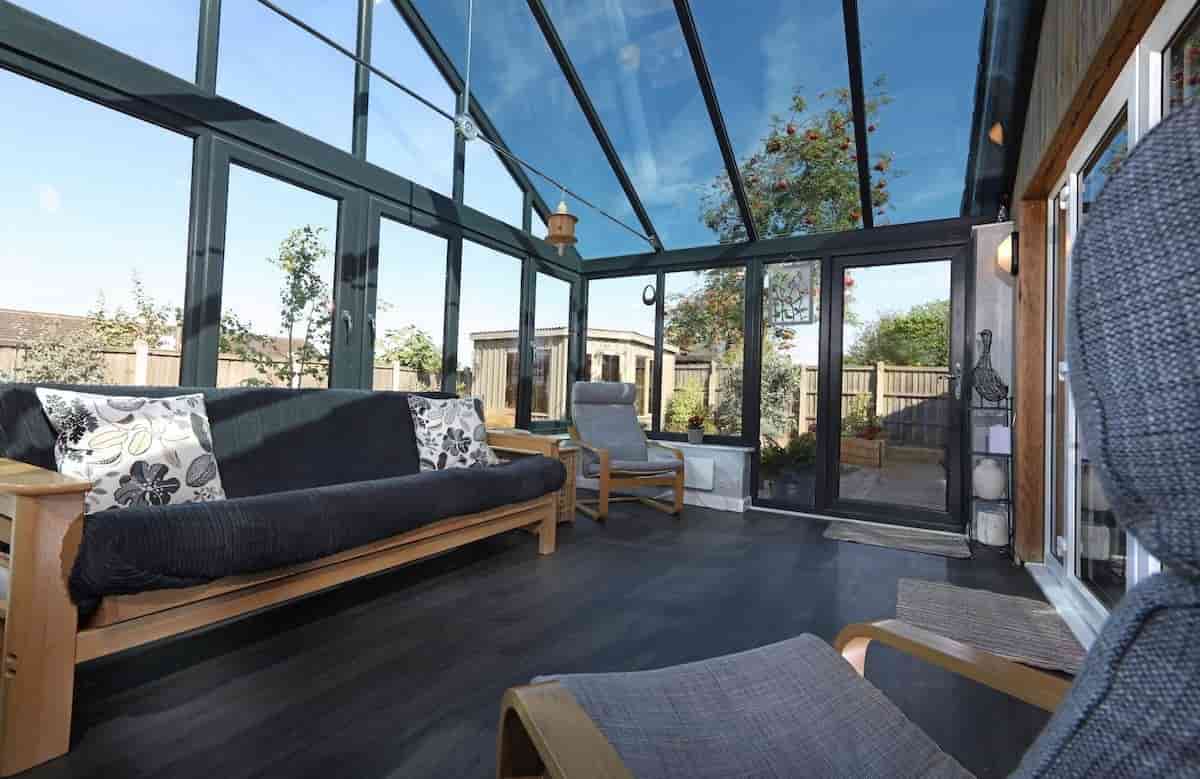 Inside a new Grey uPVC Conservatory.